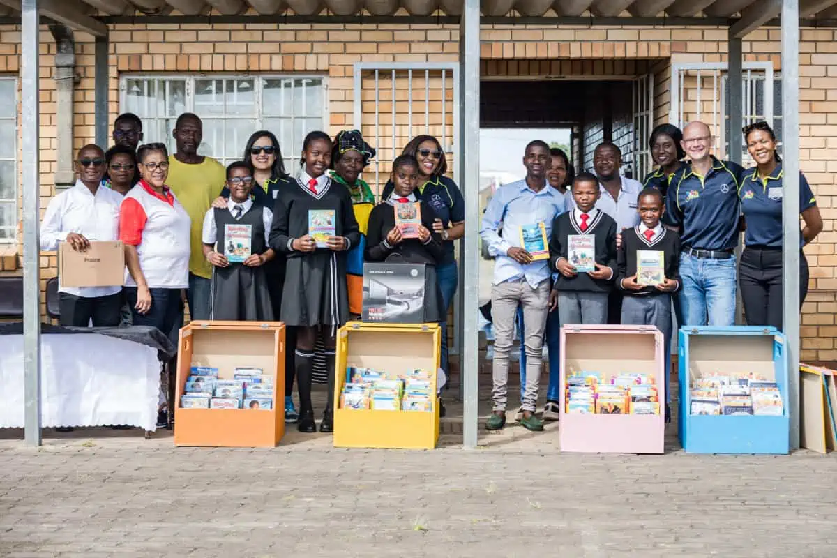 MBSA and Rally to Read representatives handing over the educational material donations.jpg