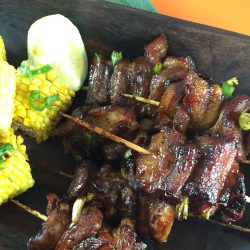 'Marinated lemongrass infused Pork Belly Skewers/sosaties grilled on the braai.